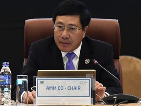 Vietnam's Foreign Minister Pham Binh Minh attends the opening of the APEC Ministerial Meeting (AMM) ahead of the Asia-Pacific Economic Cooperation (APEC) Summit leaders meetings in the central Vietnamese city of Danang Wednesday, Nov. 8, 2017. (Hoang Dinh Nam/Pool Photo via AP)