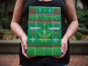 Lorilee Fedler, owner of Coast to Coast Medicinals, is pictured with her cannabis Christmas calendars in Vancouver, B.C., on Saturday November 25, 2017.