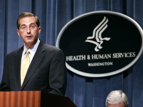 FILE - In this June 8, 2006 file photo, then Deputy Health and Human Services Secretary Alex Azar meets reporters at the HHS Department in Washington.  Azar was a top HHS official during the George W. Bush administration.  (AP Photo/Evan Vucci)