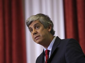 FILE In this Feb. 5 2016 file photo, Portuguese Finance Minister Mario Centeno addresses journalists at the finance ministry in Lisbon. Portugal's government said Thursday, Nov. 30 2017, that it has put forward its finance minister Mario Centeno as a candidate to become head of the group of 19 countries which share the euro currency. The eurogroup chief chairs meetings between the eurozone finance ministers and is a high-profile public figure. (AP Photo/Armando Franca, File)