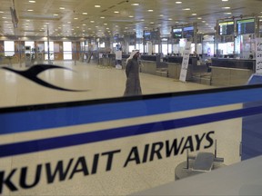 FILE - This March 18, 2012 file photo shows a view of empty Kuwait Airways check-in counters at Kuwait Airport. A German court has ruled that Kuwait's national airline didn't have to transport an Israeli citizen because the carrier would face legal repercussions at home if it did. The Frankfurt state court noted in its verdict Thursday Nov . 16, 2017 that Kuwait Airways is not allowed to close contracts with Israelis under Kuwaiti law because of the Middle Eastern country's boycott of Israel.  (AP Photo/Gustavo Ferrari, file)