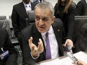 FILE - In this Nov. 30, 2016 file photo, Venezuela's Minister of Petroleum and Mining Eulogio Del Pino speaks to journalists prior to the start of a meeting of the Organization of the Petroleum Exporting Countries, OPEC, at their headquarters in Vienna, Austria. Venezuelan authorities said Thursday, Nov. 30, 2017, that they've arrested Del Pino in a widening corruption probe into the state-run oil industry. (AP Photo/Ronald Zak, File)