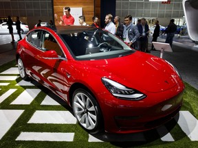 A Tesla Inc. Model 3 vehicle stands on display during AutoMobility LA ahead of the Los Angeles Auto Show in Los Angeles, California, U.S., on Thursday, Nov. 30, 2017.