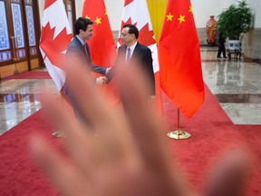As Justin Trudeau arrived at Beijing's Great Hall of the People this week, security staff tried to prevent Canadian photographers from shooting his arrival by blocking their view -- a move that surprised some journalists based in Beijing.