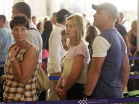 FILE - In this file photo taken on Nov. 9, 2015, Russian passengers prepare to depart from Sharm el-Sheikh Airport in south Sinai, Egypt. Russia's transportation minister said Friday, Dec. 15, 2017 flights between Moscow and the Egyptian capital of Cairo are to resume in February after a two-year hiatus. Moscow suspended flights to Egypt after an Islamic State bomb brought down a Russian airliner over Sinai in October 2015, killing all 224 people on board.