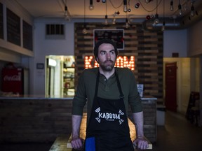 Chris Stevens, owner of Kaboom Chicken restaurant, poses for a photograph in Toronto on Friday, December 29, 2017. Ontario's new $14 per hour minimum wage does not take effect until Jan. 1, but Stevens has already taken steps to ensure his restaurant can afford the added expense.THE CANADIAN PRESS/Christopher Katsarov