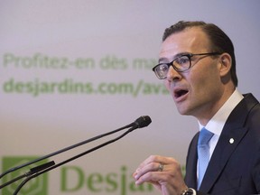 Desjardins president Guy Cormier speaks at a news conference on Saturday, March 19, 2016 at the Desjardins headquarters in Levis, Que.