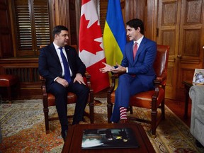 Prime Minister Justin Trudeau meets with Ukrainian Prime Minister Volodymyr Groysman in his office on Parliament Hill, in Ottawa on October 31, 2017. Eastern European diplomats and an ex-military communications specialist are warning Canada to be wary of Russian meddling in it politics and financial system, saying the country is not immune to Kremlin interference. The warnings come as Foreign Affairs Minister Chrystia Freeland is Ukraine Friday for talks with officials there on their ongoing struggle with Russian military action in their eastern region, and the fallout of Moscow's 2014 annexation of Crimea. Freeland is also using the visit to get more information on a report that a Russian spy infiltrated a meeting between Prime Minister Justin Trudeau and Ukrainian Prime Minister Volodymyr Groysman this past fall, officials said Friday.