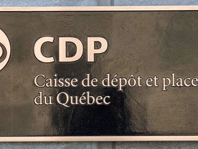 The plaque in front of the Caisse de dépôt et placement du Québec headquarters is shown on Wednesday, Feb. 25, 2009 in Quebec City.