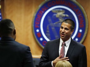 Federal Communications Commission (FCC) Chairman Ajit Pai arrives for an FCC meeting where they will vote on net neutrality, Thursday, Dec. 14, 2017, in Washington.