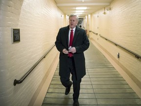 Rep. Mark Meadows, R-N.C., chairman of the conservative Freedom Caucus, arrives for a closed-door strategy session with House Republicans as the deadline looms to pass a spending bill to fund the government by week's end, on Capitol Hill in Washington, Tuesday, Dec. 5, 2017.