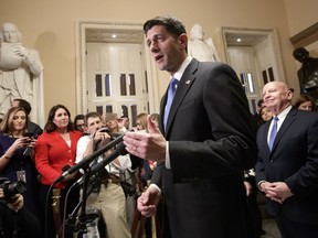 Speaker of the House Paul Ryan, R-Wis., joined at right by House Ways and Means Committee Chairman Kevin Brady, R-Texas, meets reporters just after passing the Republican tax reform bill in the House of Representatives, on Capitol Hill, in Washington, Tuesday, Dec. 19, 2017. The vote, largely along party lines, was 227-203 and capped a GOP sprint to deliver a major legislative accomplishment to President Donald Trump after a year of congressional stumbles.