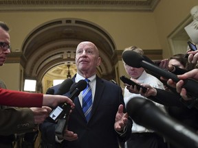 House Ways and Means Committee Chairman Rep. Kevin Brady, R-Texas., speaks to reporters on Capitol Hill in Washington, Friday, Dec. 15, 2017, on the progress of an agreement on a sweeping overhaul of the nation's tax laws.