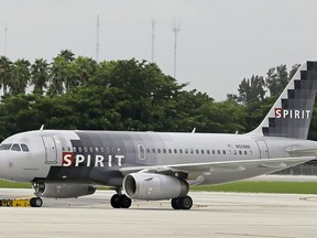 In this Wednesday, Aug. 31, 2016, photo, a Spirit Airlines passenger plane arrives at the Fort Lauderdale-Hollywood International Airport in Fort Lauderdale, Fla. On Wednesday, Dec. 13, 2017, Spirit announced CEO Robert Fornaro will step down in January 2019 and be replaced by the company's current chief financial officer, Ted Christie.