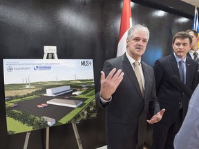 Stephen Matier, left, president of Maritime Launch Services and Maksym Degtiarov, chief designer of the launch vehicle at the Yuzhnoye Design Bureau, talk with reporters at a meeting of the proposed Spaceport project team in Dartmouth, N.S. on Monday, Dec. 11, 2017. The facility, to be built near Canso, N.S., will be used to launch Ukrainian-built Cyclone 4M rockets into space.