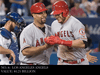 Los Angeles Angels' C.J. Cron, right, is congratulated by teammate Albert Pujols