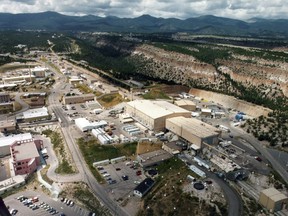 FILE - This undated file aerial photo shows the Los Alamos National laboratory in Los Alamos, N.M. By conducting some of the most high-tech research in the world, maintaining the U.S. stockpile of nuclear weapons and cleaning up after decades of bomb-making, the Department of Energy has its share of management challenges. A report released this week outlines some of those challenges while providing a look at the expansive scope of the department's responsibilities and costly liabilities. (The Albuquerque Journal via AP, file)