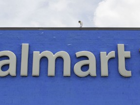 FILE - This June 1, 2017, file photo shows a Walmart store in Hialeah Gardens, Fla. Wal-Mart Stores Inc. is changing its legal name effective Feb. 1, 2018, to Walmart Inc. from Wal-Mart Stores Inc.