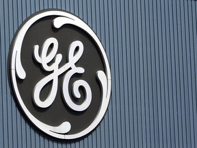 FILE - This June 24, 2014, file photo, shows the General Electric logo at a plant in Belfort, France. GE saw its stock price slump in 2017.