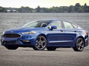This photo provided by Ford Motor Co. shows a 2017 Ford Fusion, a midsize sedan that features premium options and a number of good engine choices. Deals can be had on this car now. (Courtesy of Ford Motor Co. via AP)