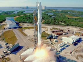 It's NASA's first use of a reused Falcon and only the second of a previously flown capsule.  (NASA via AP)