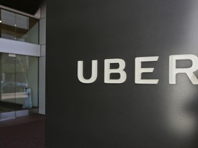 FILE - This March 1, 2017, file photo shows an exterior view of the headquarters of Uber in San Francisco. A group led by Japanese technology conglomerate Softbank has acquired a major stake in Uber. In a tender offer that expired Thursday, Dec. 28, SoftBank acquired a 15 percent stake in Uber while the remaining members got about 3 percent, according to a person familiar with the situation who was not authorized to publicly discuss details.
