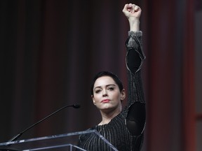 Actress Rose McGowan speaks at the inaugural Women's Convention in Detroit, Friday, Oct. 27, 2017. McGowan recently went public with her allegation that film company co-founder Harvey Weinstein raped her.