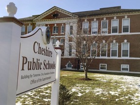 This Dec. 13, 2017 photo, shows the exterior of the board of education headquarters in Cheshire, Conn. Schools in the town have suspended use of the Summit Learning program, a go-at-your-own-pace personalized online learning platform built by a California charter school network with help from Facebook engineers. Parents who organized against it said there was no need to change what's worked in a town with a prized reputation for good schools. Superintendent Jeffrey Solan said he accepted the change was too much for some, and announced the program would be suspended.