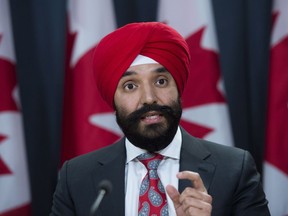 Navdeep Bains, Minister of Innovation, Science and Economic Development, speaks at an announcement on fighter jets at the National Press Theatre in Ottawa on Tuesday, Dec. 12, 2017.