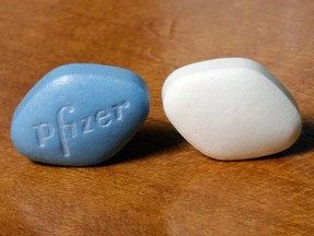 The blue tablet of Pfizer's Viagra, left, and the company's generic version, sildenafil citrate on the right.