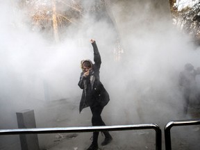Anti-government protesters demonstrated in Iran on Sunday in defiance of a warning by authorities of a crackdown, extending for a fourth day one of the most audacious challenges to the clerical leadership since pro-reform unrest in 2009.