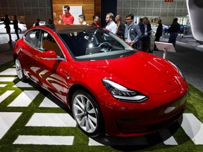 A Tesla Inc. Model 3 vehicle stands on display during AutoMobility LA ahead of the Los Angeles Auto Show in Los Angeles, California, U.S., on Thursday, Nov. 30, 2017.