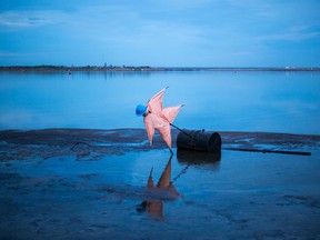 A scarecrow set up in a tailings pond. Tailings ponds represent perhaps the most serious environmental challenge facing the oilsands industry.