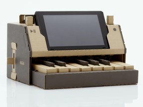 The Nintendo Labo Variety Kit for Nintendo Switch includes a cardboard punchout model of a working piano.