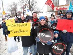 Protesters at a Tim Hortons location in Montreal on Friday.