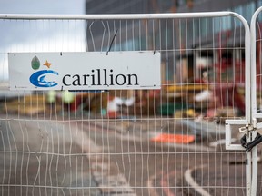 A padlock sits on fencing surrounding the Midland Metropolitan Hospital construction site, operated by Carillion Plc, in Smethwick, U.K.