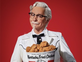 In commercials starting next week, Reba McEntire dons the Colonel's famous white suit and black tie.