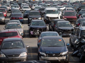 Damaged vehicles are seen at the Insurance Corporation of British Columbia's Lower Mainland Salvage Yard, in New Westminster, B.C.