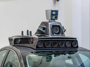 (FILES) This file photo taken on September 13, 2016 shows the cameras on a pilot model of an Uber self-driving car at the Uber Advanced Technologies Center in Pittsburgh, Pennsylvania.