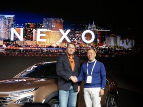 Chris Urmson, left, cofounder of Aurora Innovations, at the CES last week with Hyundai Hyundai vice chairman Eui Sun Chung.