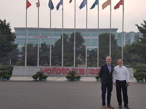 RepliCel CEO Lee Buckler and YOFOTO Chairman Mr. Huang Jin Bao outside YOFOTO headquarters in Ningbo, Zhejiang Province, China.