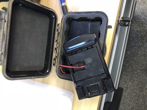 This December 2017 photo provided by Mark McBride shows what Oklahoma state Rep. Mark McBride, R-Moore, says is a tracking device that he removed from his truck in Oklahoma. McBride wants to know who put the contraption there and is one of at least five Oklahoma state lawmakers who in recent months asked a prosecutor to investigate claims they have been followed or threatened.