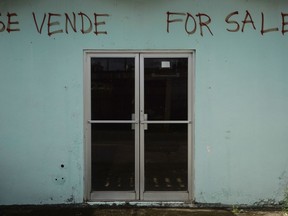 In this Friday, Jan. 19, 2018 photo, shows one of multiple properties located in the Esperanza sector that are currently for sale, in Vieques, Puerto Rico. Hundreds of thousands of Puerto Ricans face losing their homes upon the expiration of a three-month moratorium on mortgage payments that banks offered after Hurricane Maria devastated the island