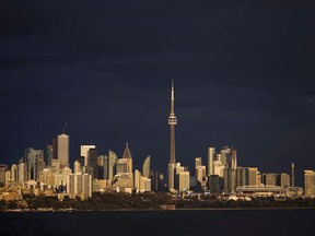 Light from the sunset hits the skyline in Toronto, Ont., on Tuesday October 31, 2017. Toronto is the only Canadian city on Amazon Inc.'s short list of 20 candidates for a second North American headquarters.