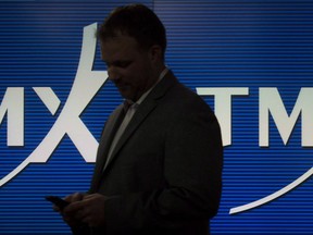 A man works in the TMX broadcast centre in Toronto, May 9, 2014. The Toronto Stock Exchange's S&P/TSX composite index was up 42.97 points to 16,351.15, after 90 minutes of trading.