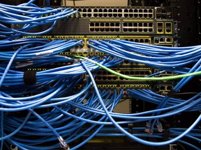 Networking cables and circuit boards are shown in Toronto on Wednesday, November 8, 2017.