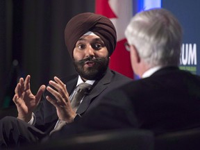 Innovation, Science and Economic Development Minister Navdeep Singh Bains speaks with moderator John Manley during a policy conference in Ottawa, Wednesday October 12, 2016. For all of Canada's efforts to promote the North American Free Trade Agreement on U.S. soil, there are concerns one important voice from the north has been a little quieter than the rest: Canadian business.