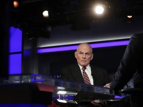 White House chief of staff John Kelly pauses to look to a video monitor as he appears on Special Report with Bret Baier on Fox News in Washington, Wednesday, Jan. 17, 2018. Kelly says Trump has evolved on many issues since the campaign. Kelly says in an interview with Baier that "there's been an evolutionary process that this president's gone through" on issues ranging from Afghanistan to his promised Southern border wall.