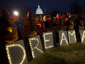 Demonstrators rally in support of Deferred Action for Childhood Arrivals (DACA) during a rally outside of the Capitol Sunday, Jan. 21, 2018, in Washington, on second day of the federal shutdown. Democrats have been seeking a deal to protect the "Dreamers," who have been shielded against deportation by DACA, which President Donald Trump halted last year.