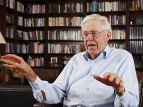 FILE - In this May 22, 2012 file photo, Charles Koch speaks in his office at Koch Industries in Wichita, Kan.The Koch brothers are spending up to $400 million to shape November's midterm elections nationwide.